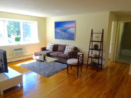 Here is a look at the Living Room.  Many of our apartments feature stunning hardwood floors ! !